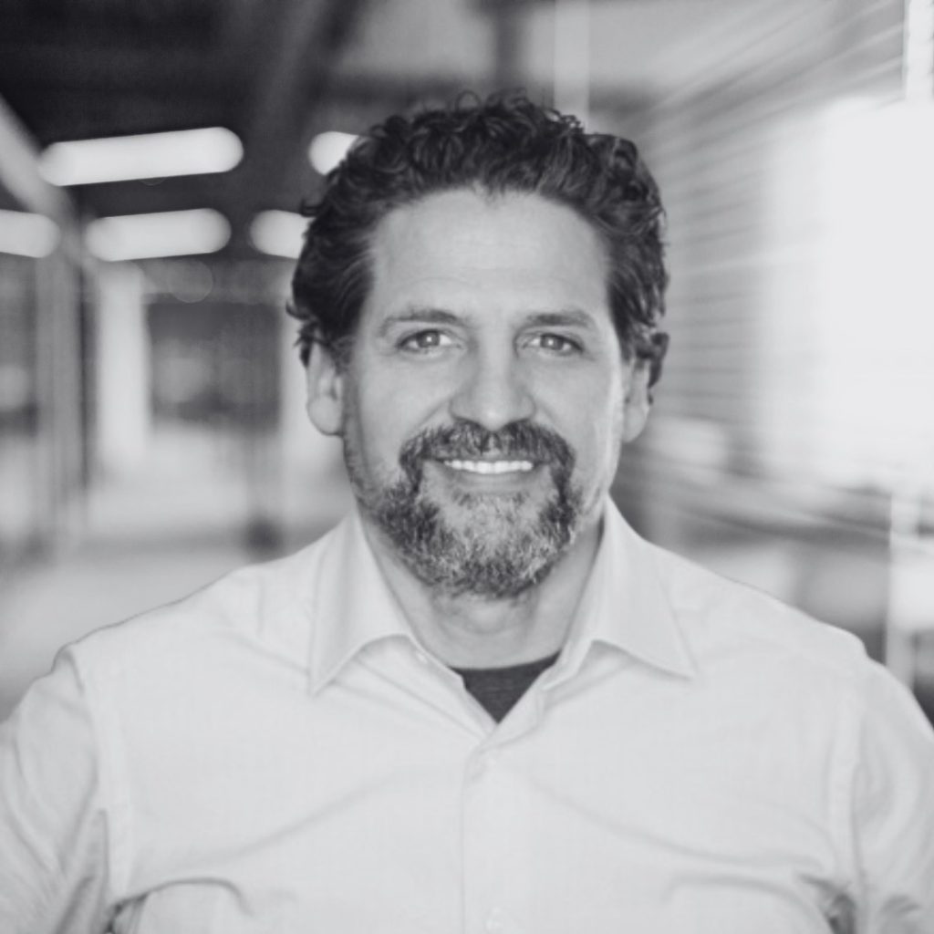 A photo of Ben Greene in black and white