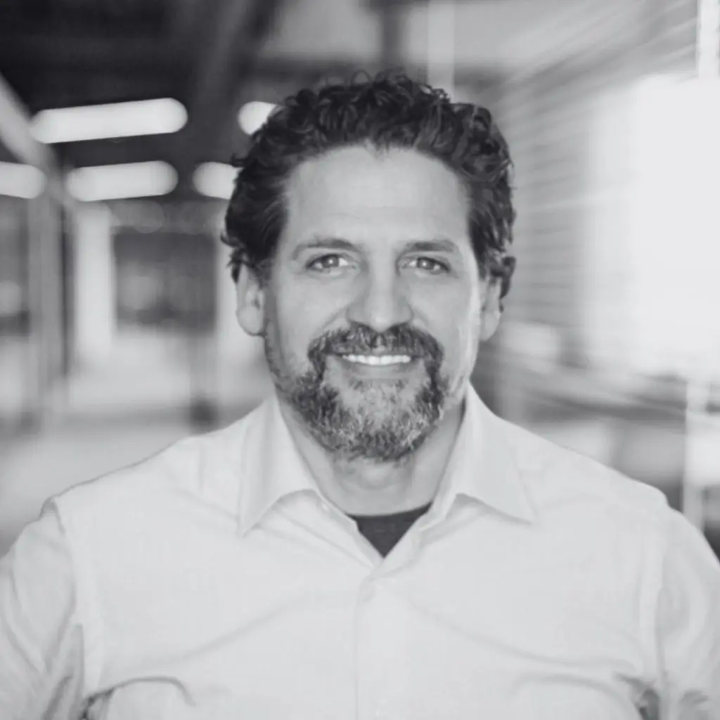 A photo of Ben Greene in black and white