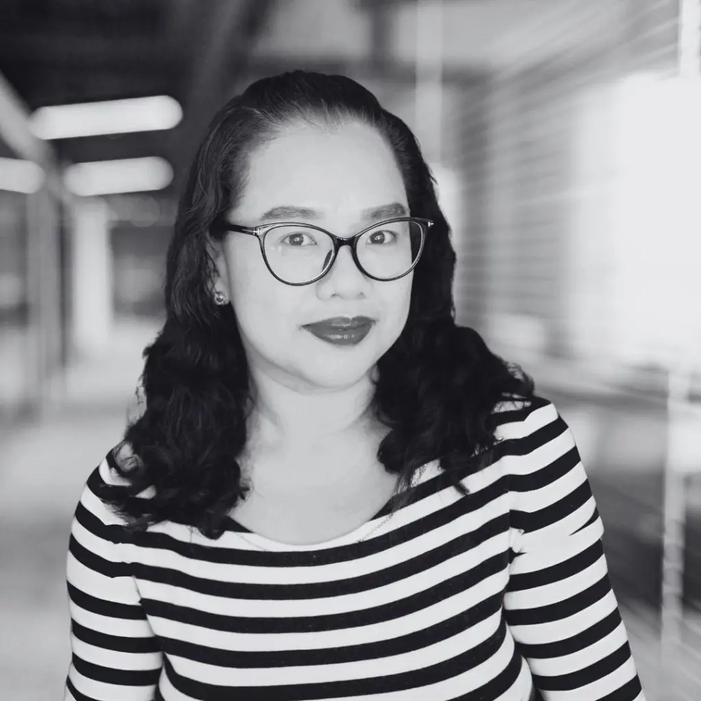 A photo of Ara Yu in black and white