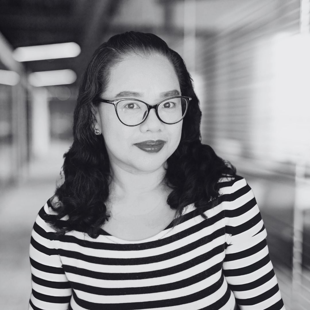 A photo of Ara Yu in black and white