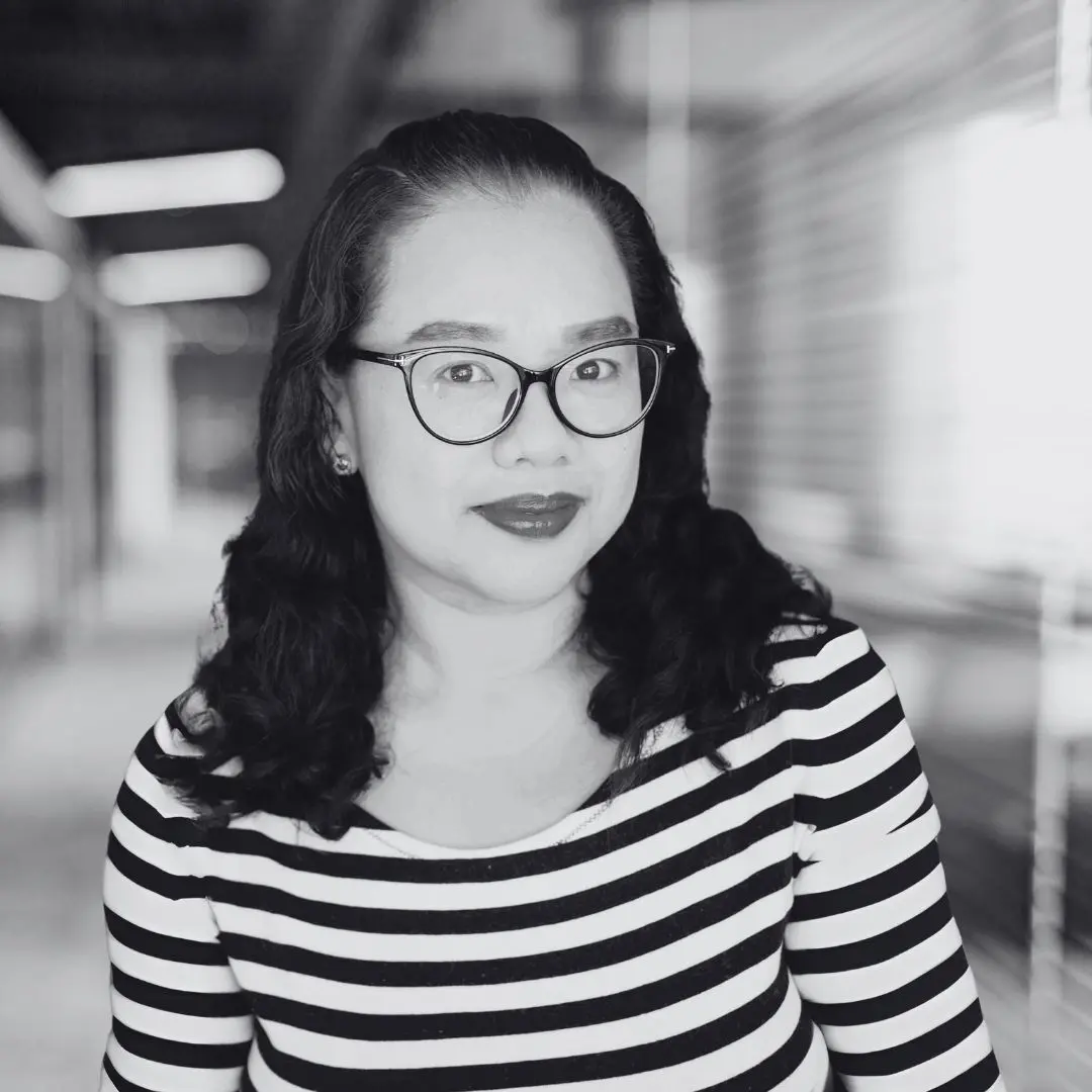 A photo of Ara Yu in black and white
