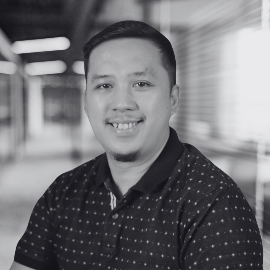 A photo of Emman Camaing in black and white