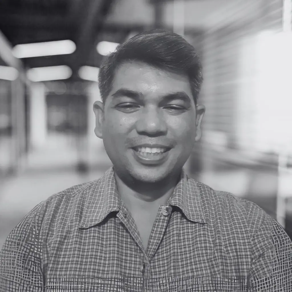 A photo of Jasper dela Cruz in black and white