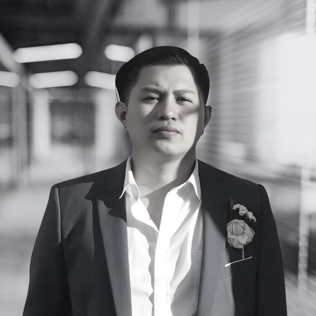 A photo of Kenneth Pamilar in black and white