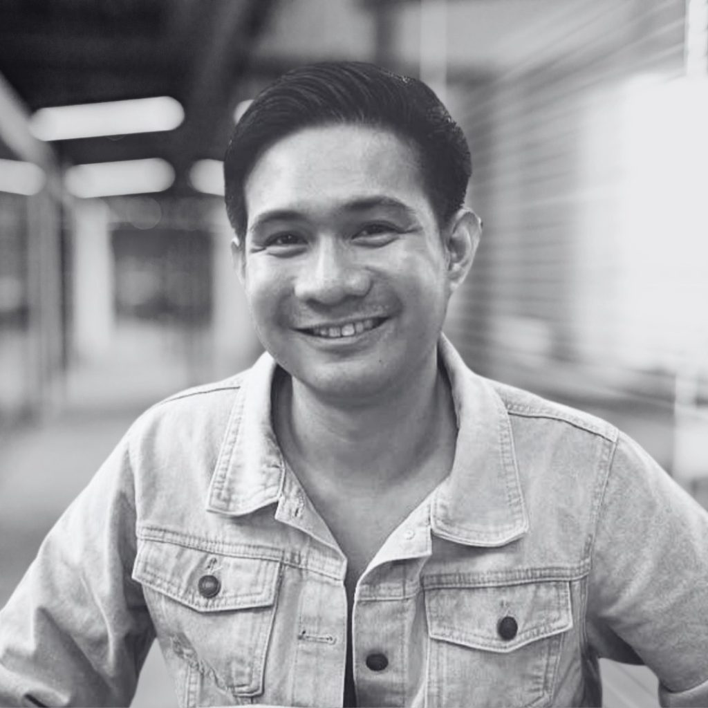 A photo of Luis Pambid in black and white