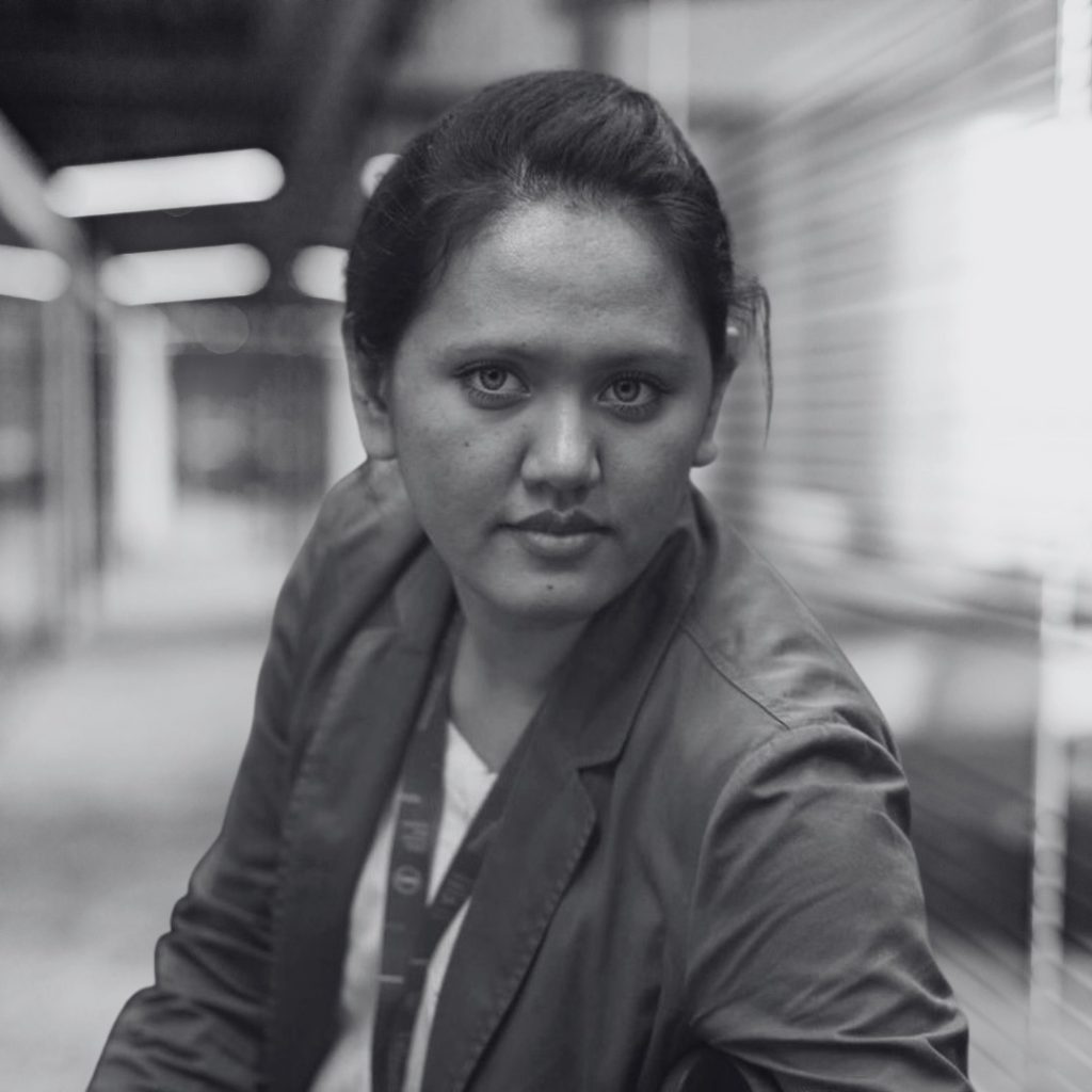 A photo of Lyn Kasim in black and white