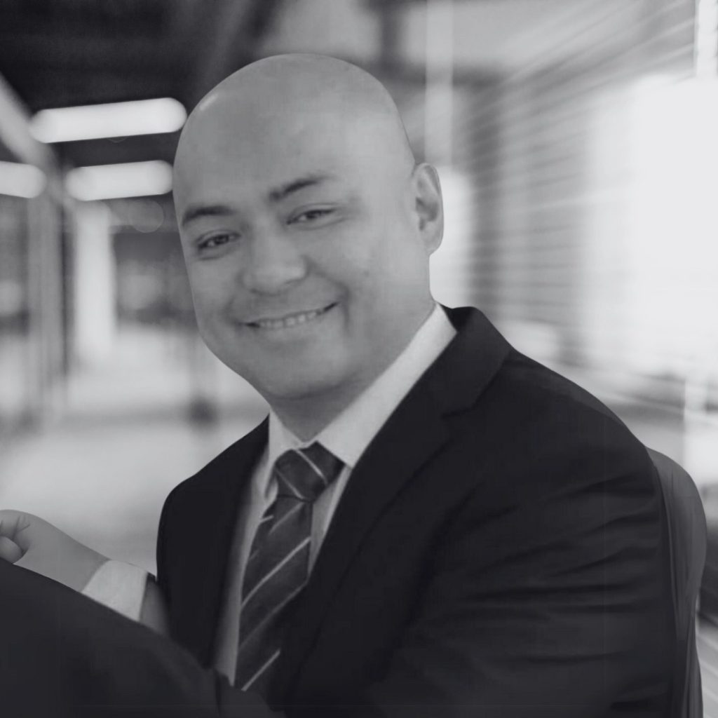 A photo of Roy Dimaculangan in black and white